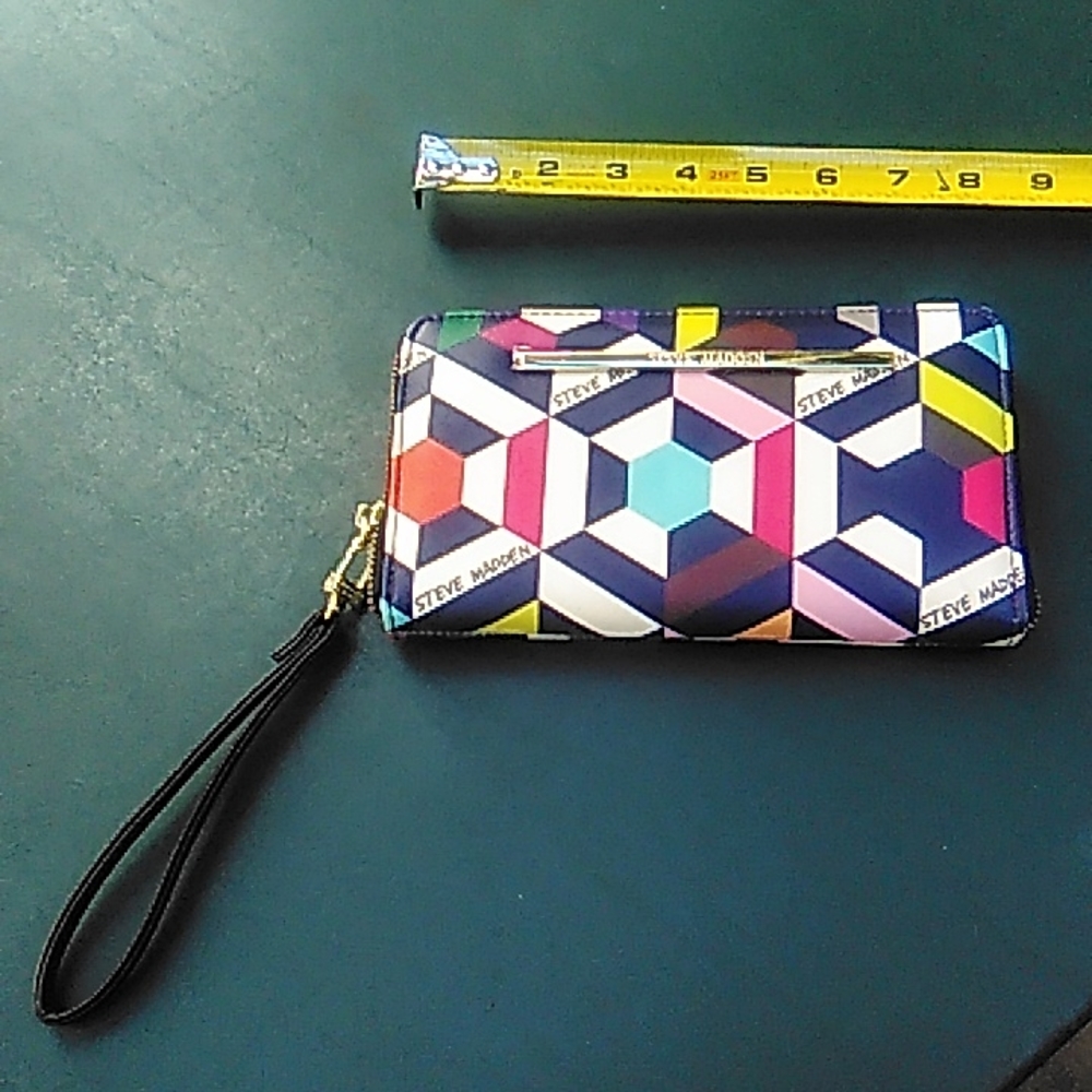 Billfold with wrist strap.